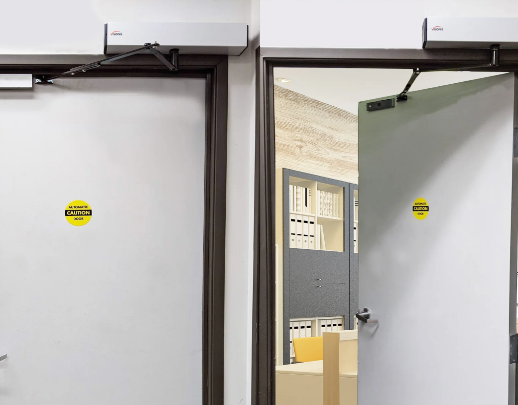 A door with a yellow sticker on it is open and closed.