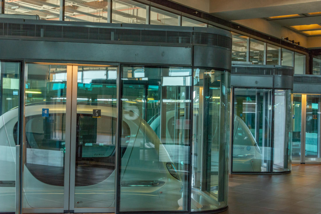 A row of sliding glass doors in a building.