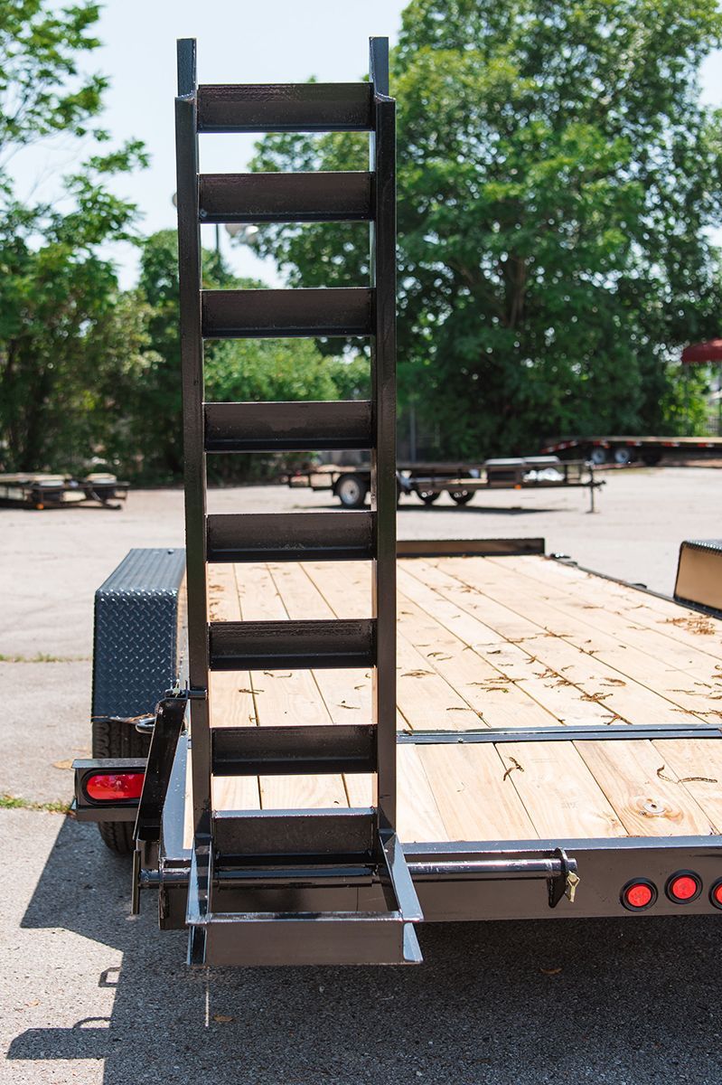 Equipment trailer with stand-up ramp