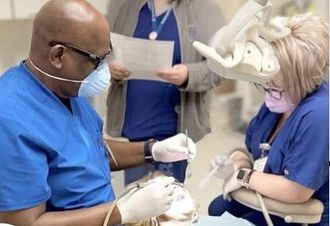 man talking to a doctor