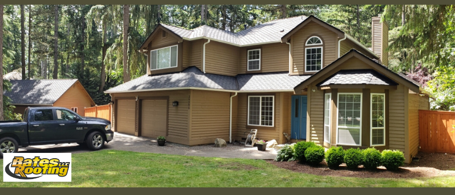 A large house with a truck parked in front of it