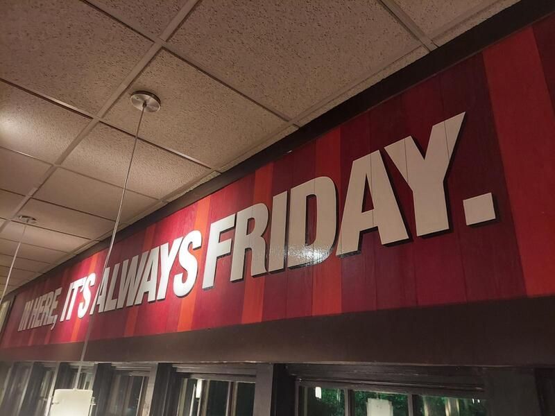 A sign that says ' it 's always friday ' on it