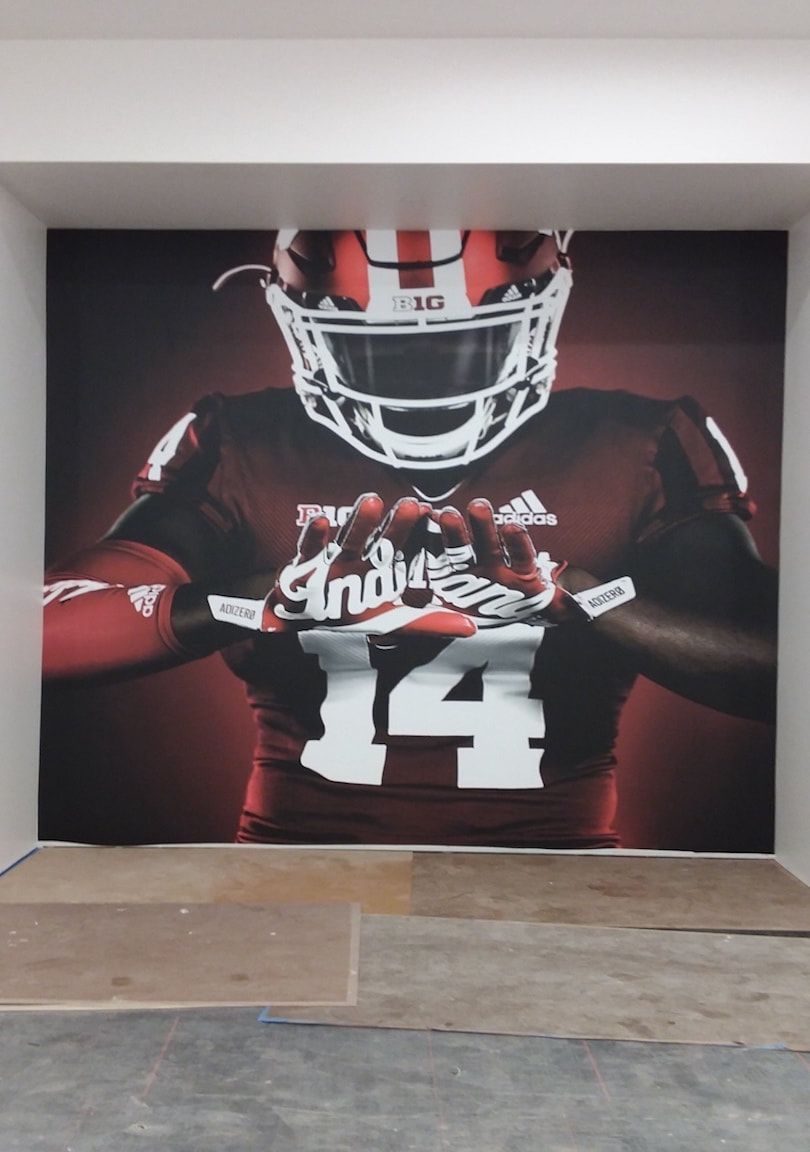 A football player with the number 14 on his jersey