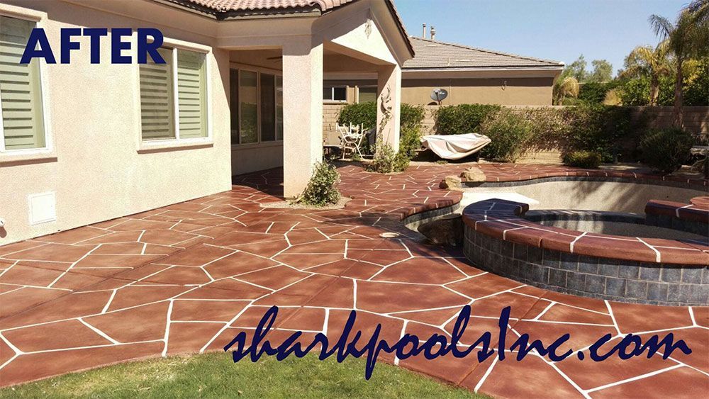 A picture of a patio that has been painted by sharkpools inc.