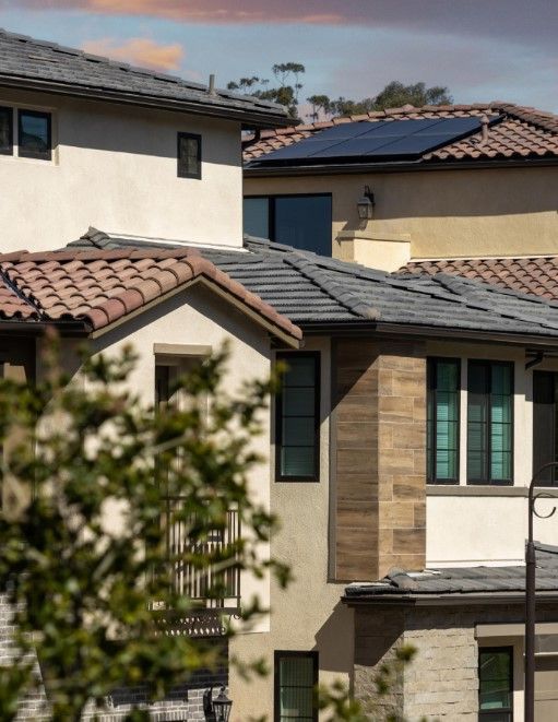 A house with a solar panel on the roof