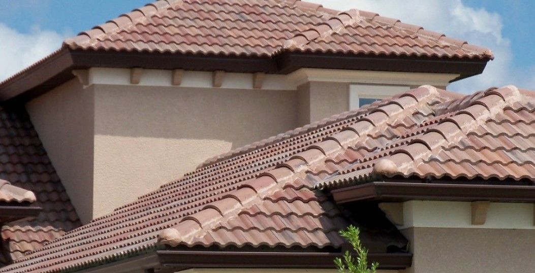 A house with a tiled roof and a window
