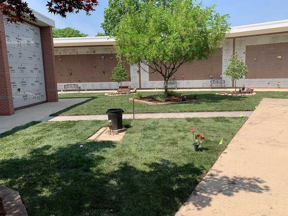 Turbulent ocean wave, blue-green water, white foam crashing, aerial view.