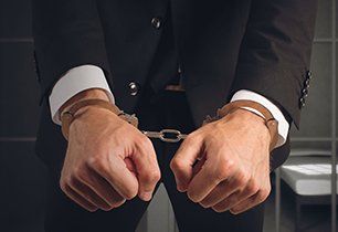 Handcuffed businessman