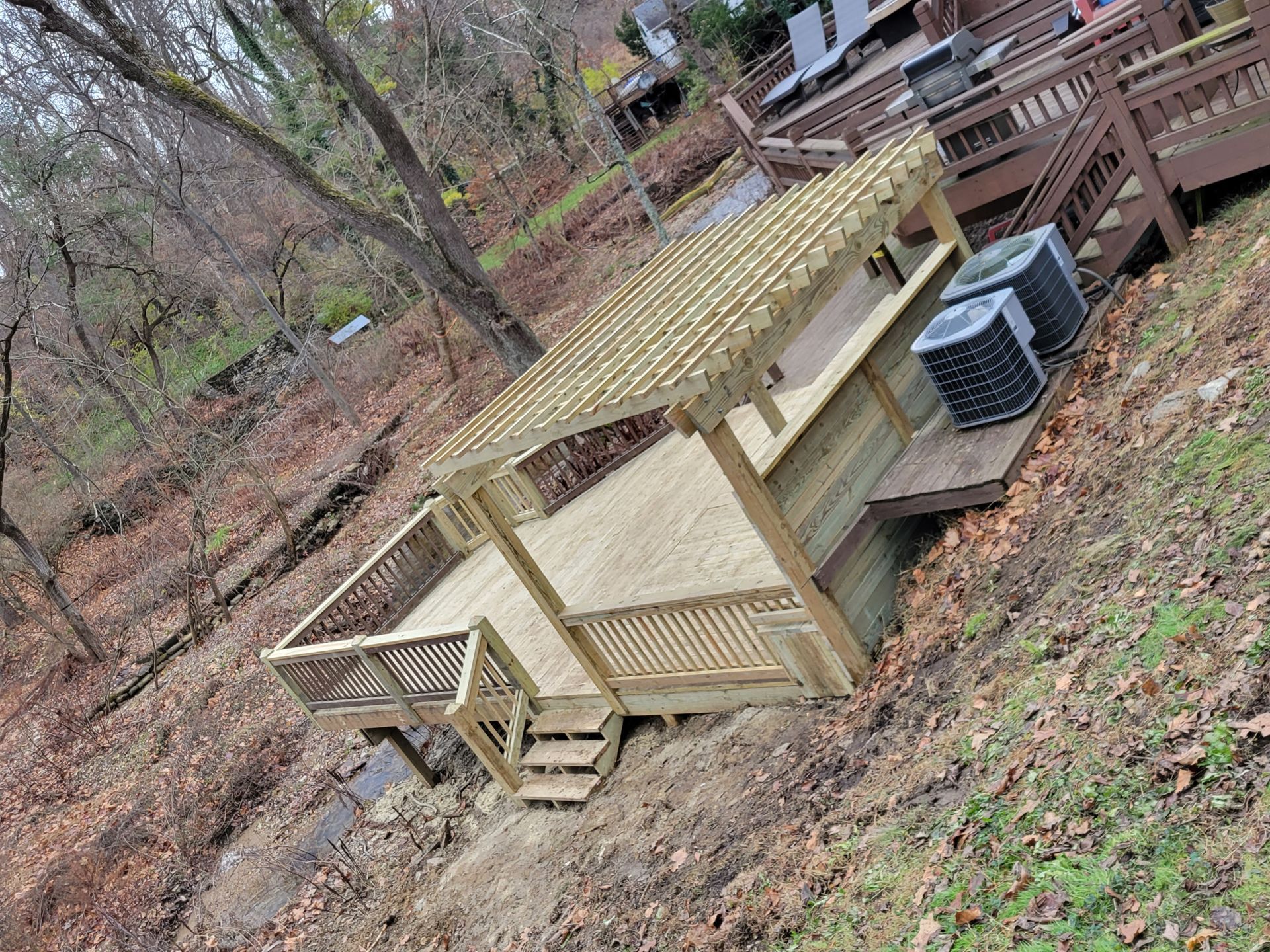 wooden deck with pergola
