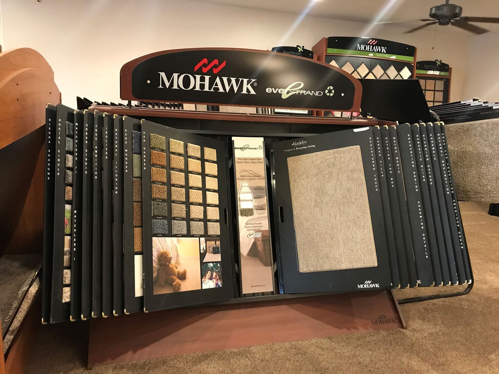 A display of mohawk carpets and tiles in a store