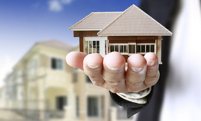 home model in hand