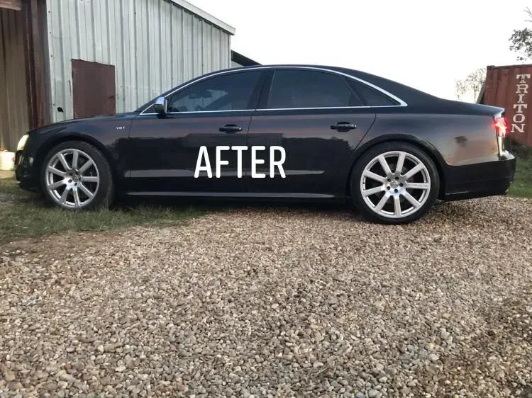 Black sedan parked on gravel beside a shed, with “AFTER” text overlaid on the car.