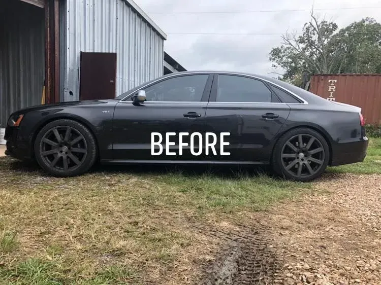 Black sedan parked beside a metal building with “BEFORE” text overlaid.