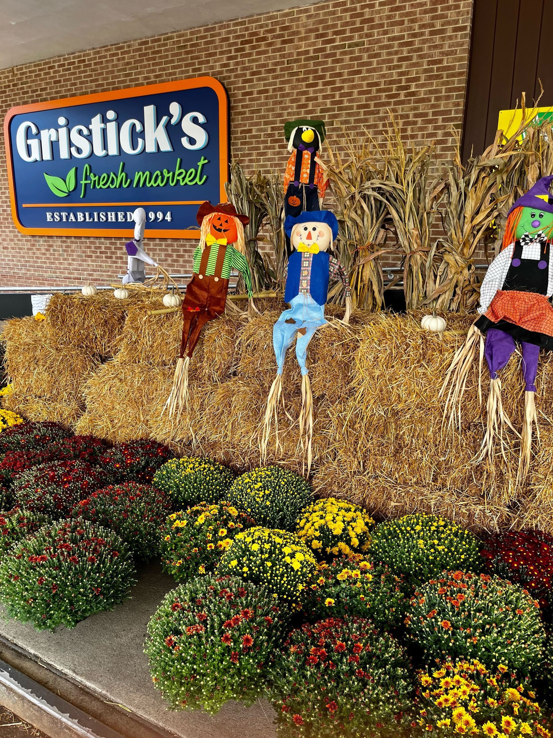 Fall decor front entrance scarecrows