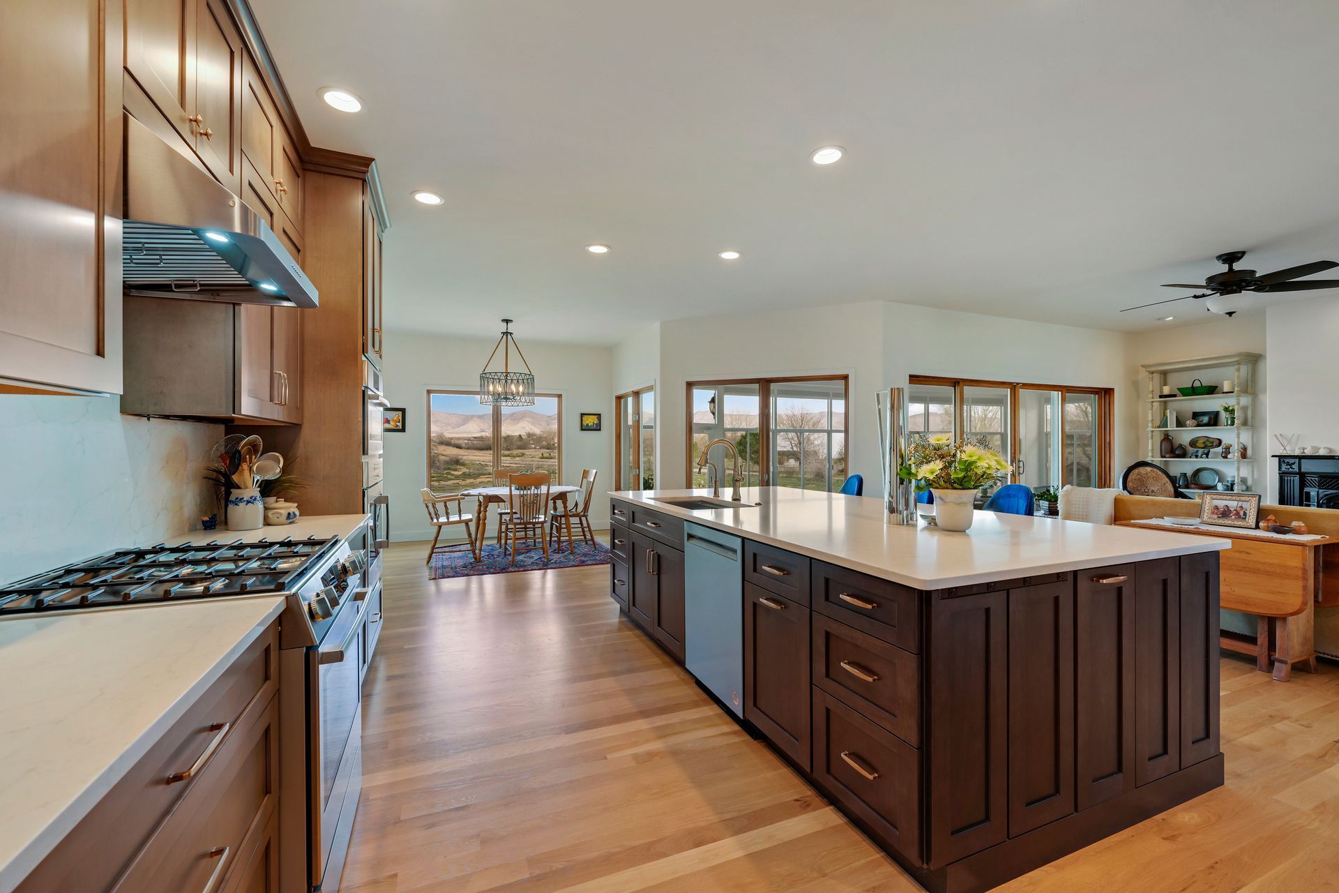 A kitchen with a large island in the middle of it