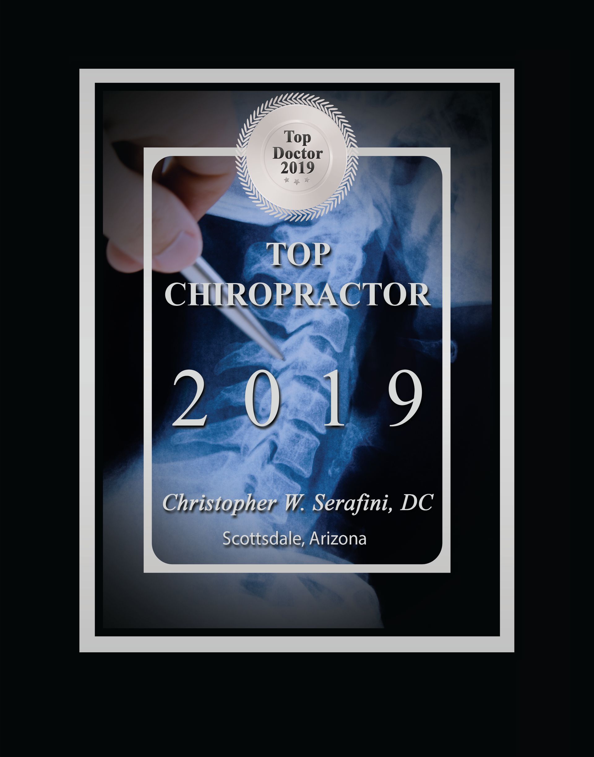 Top Chiropractor 2019 award plaque, with an X-ray background