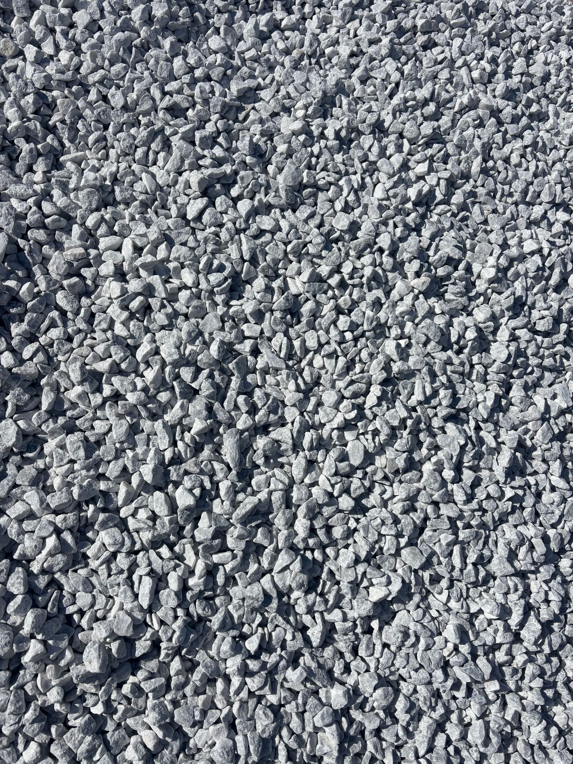 Close-up of gray gravel stones covering the ground