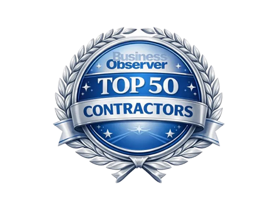 Blue and silver Business Observer Top 50 Contractors award emblem with laurel wreath