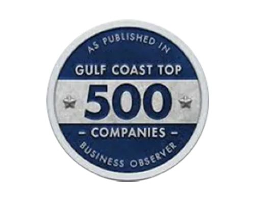 Blue and silver award badge reading “Gulf Coast Top 500 Companies” and “As Published in Business Observer”