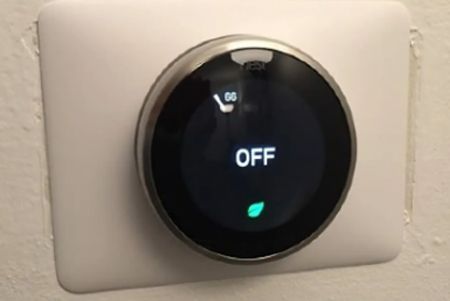 A smart thermostat with the word off on it