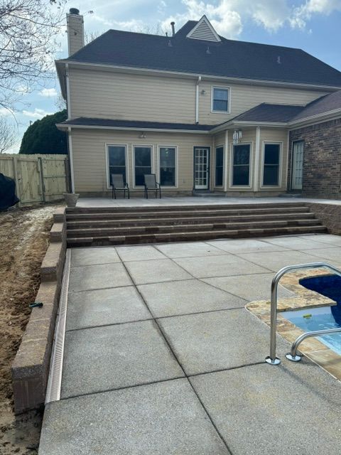A large house with a swimming pool in front of it