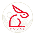 Red rabbit outline logo with “ROCKS” text in a circular beige emblem