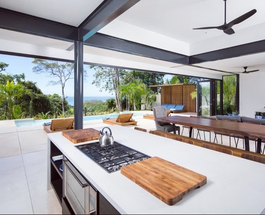 kitchen counter overlooking the pool area