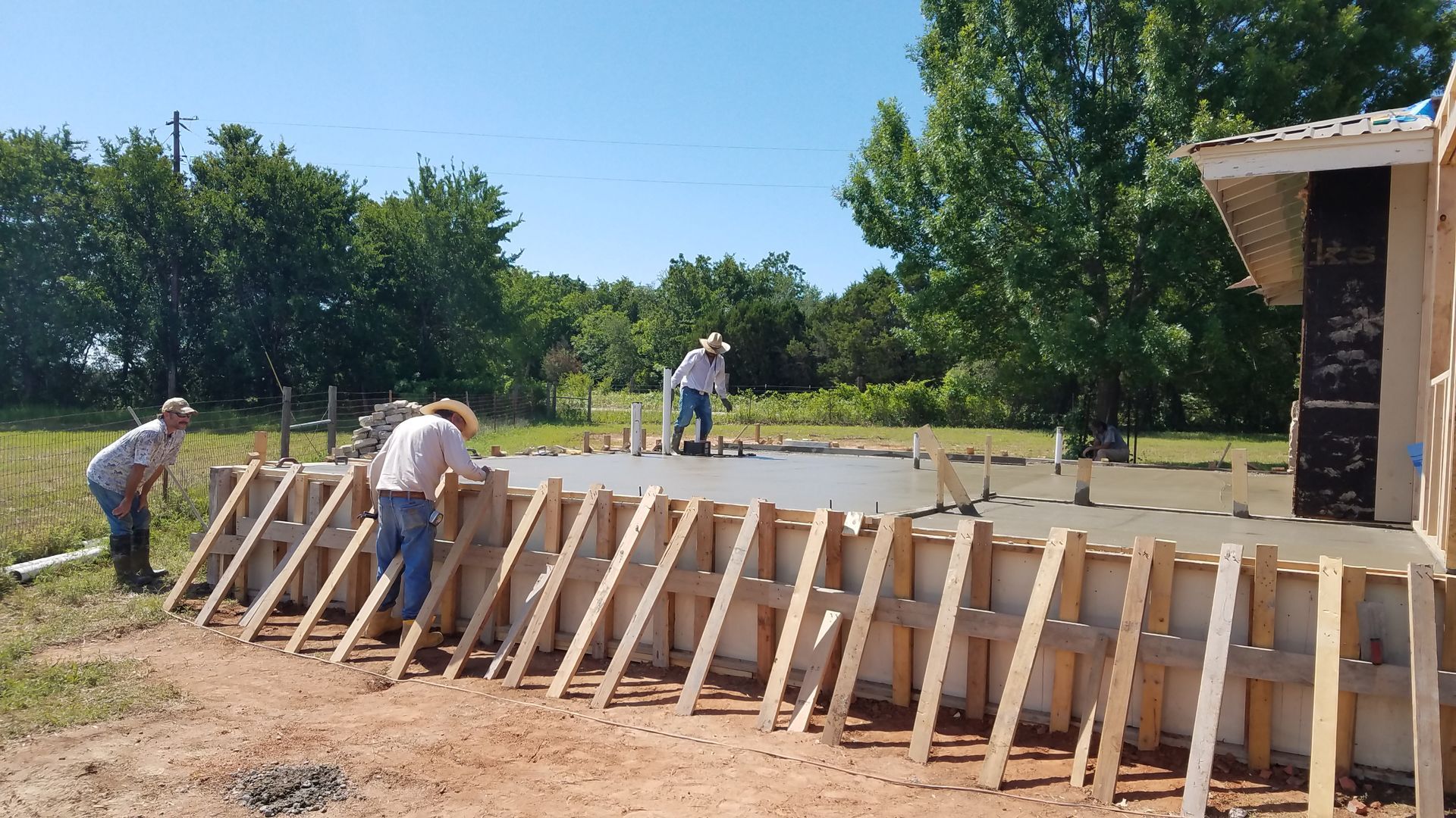 A group of men are working on a construction site