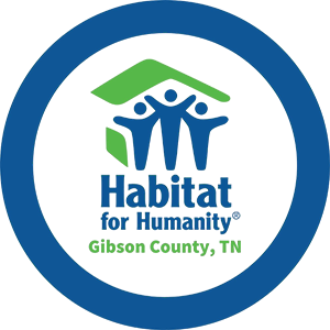 Habitat for Humanity logo with figures under a green roof, blue circle with Gibson County, TN.