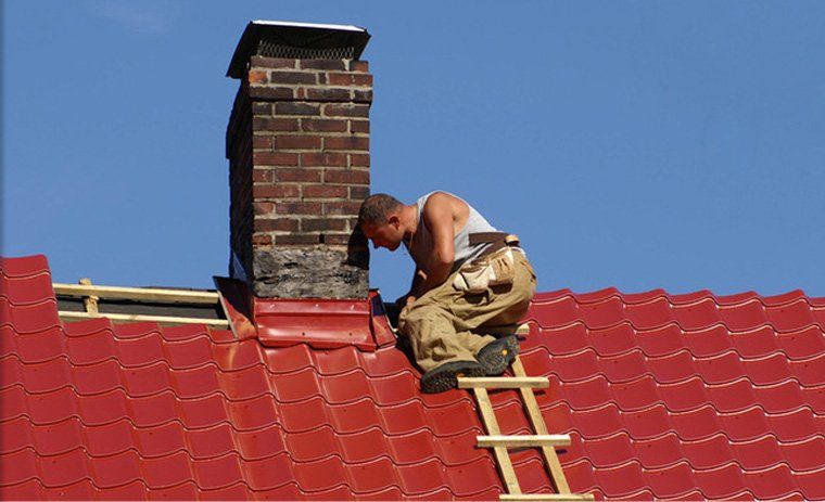 Man repairing a chimney