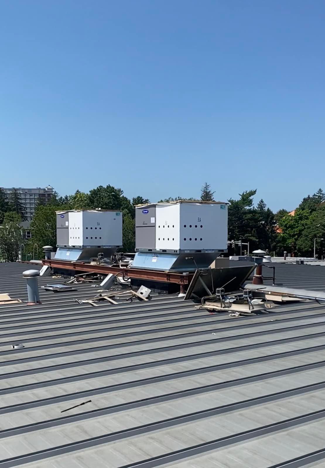 A roof with a few boxes on top of it