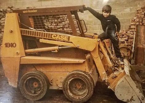 kid on a excavating truck