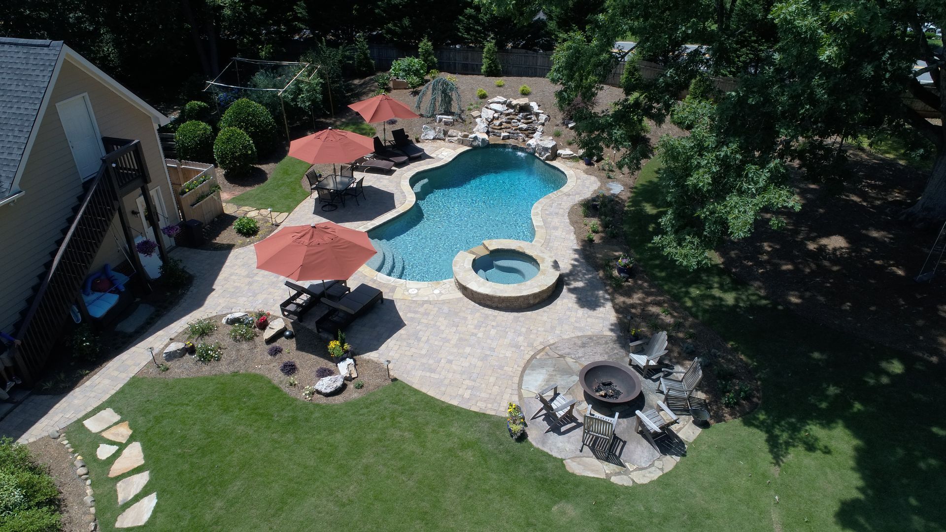 Newly renovated freeform pool in Sugar Hill, GA
