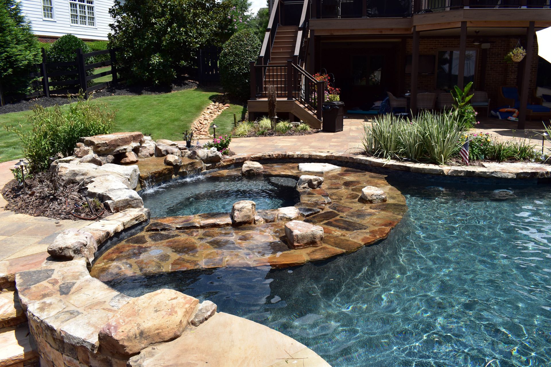 Renovated freeform pool in Suwanee, GA