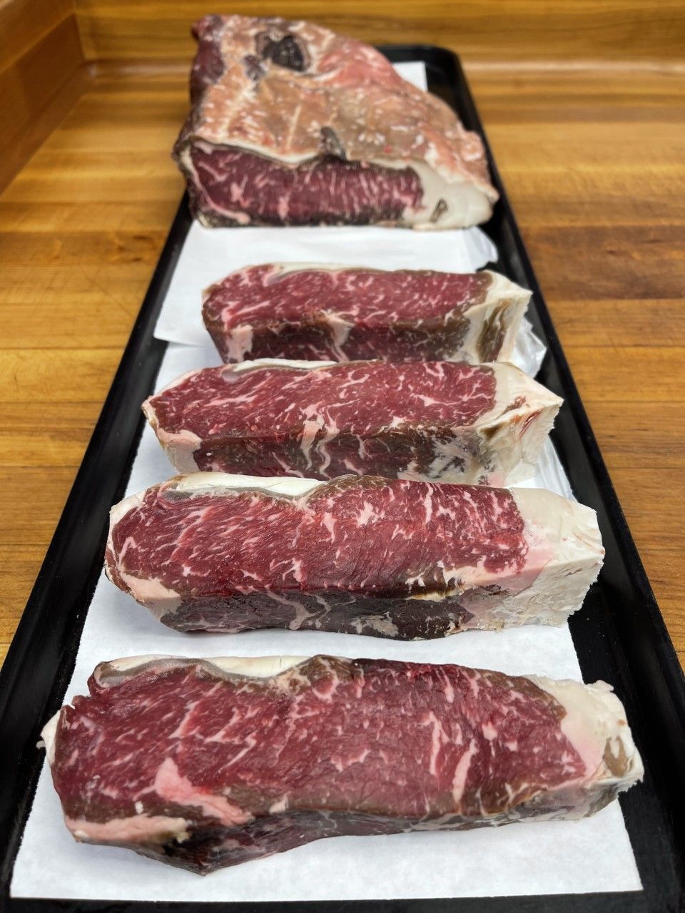 Dry aged NY strips
