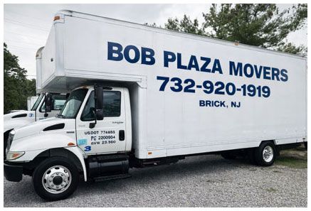 White Bob Plaza Movers truck with phone number and Brick, NJ, location.