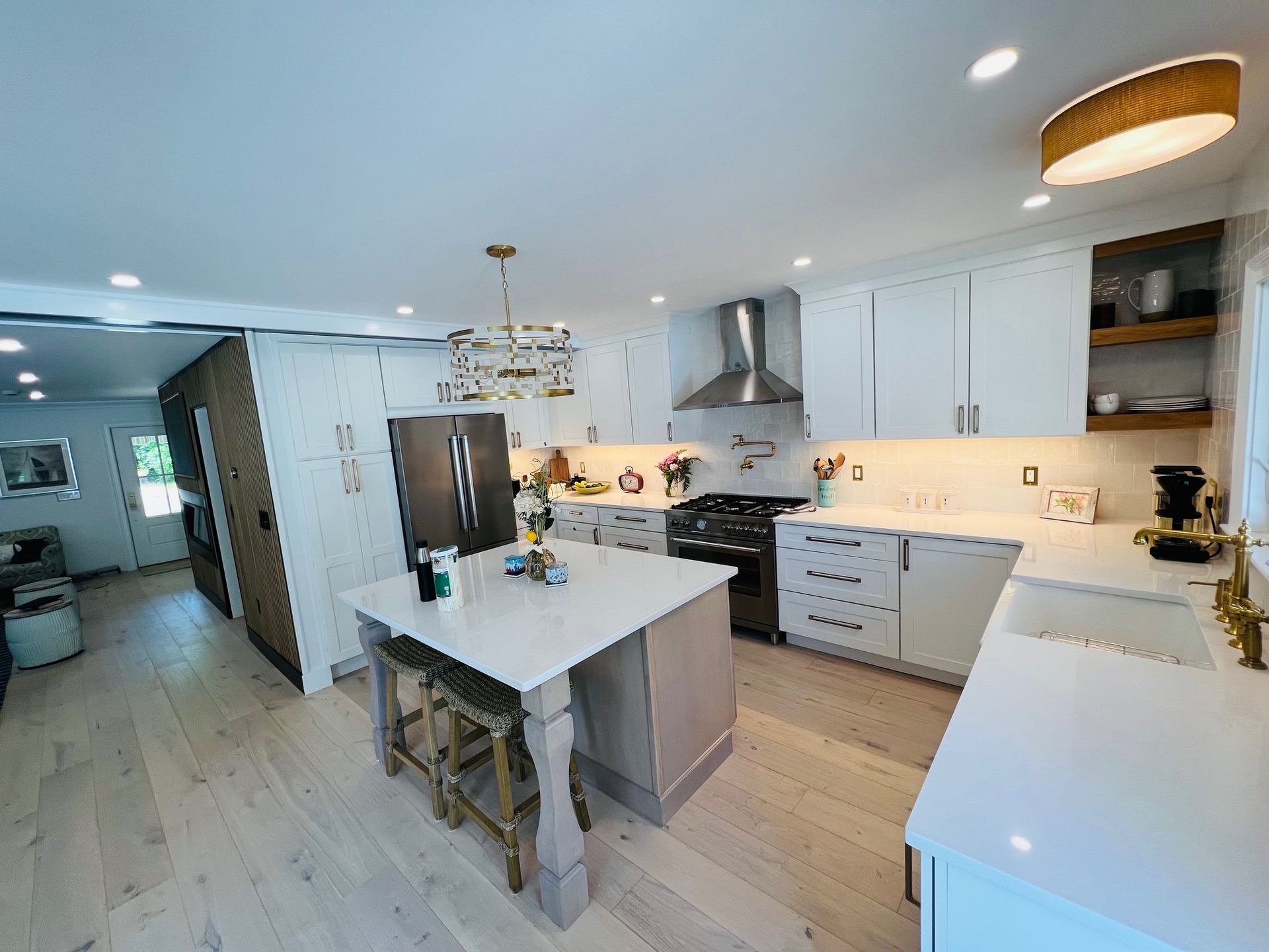 There is a large island in the middle of the kitchen.