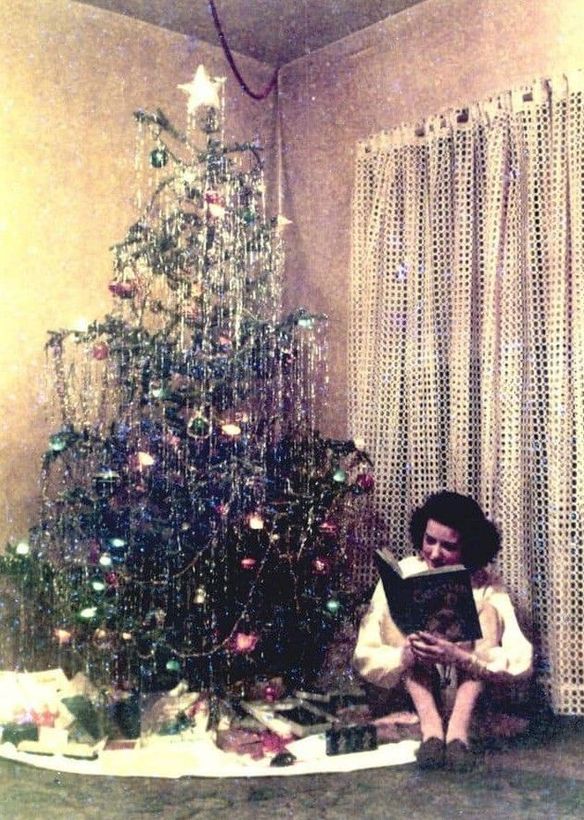 A desk with a computer and a sign that says familyography