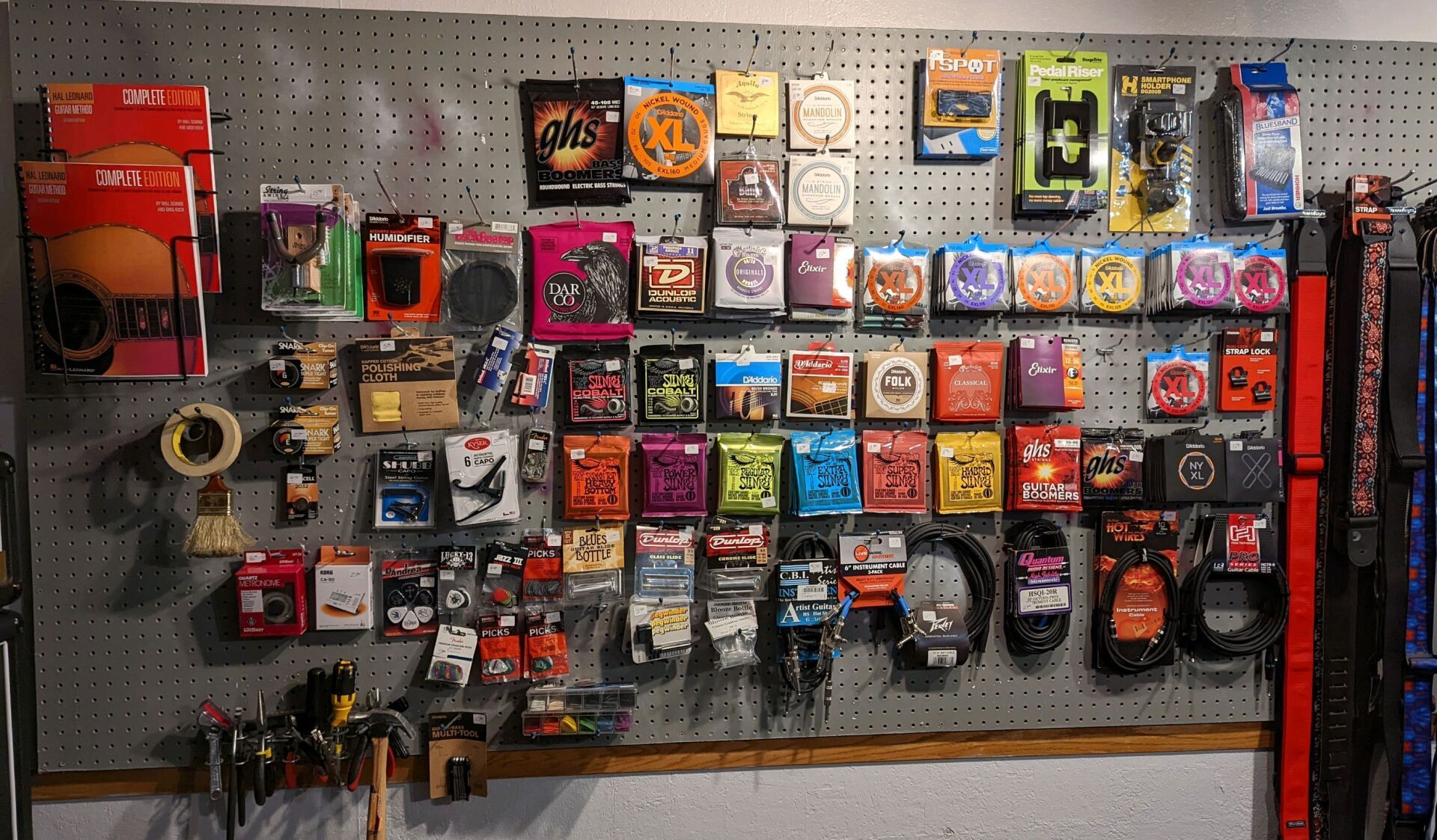 wall with small equipment such as headphones  and other small equipment