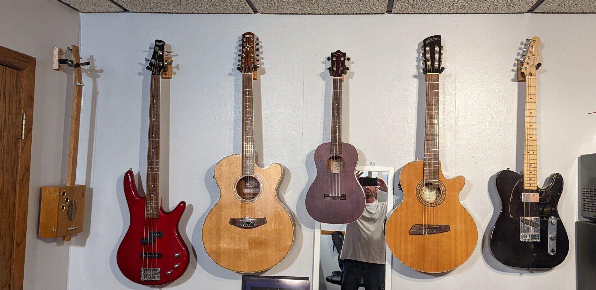 image of 4 guitars 3 acoustic