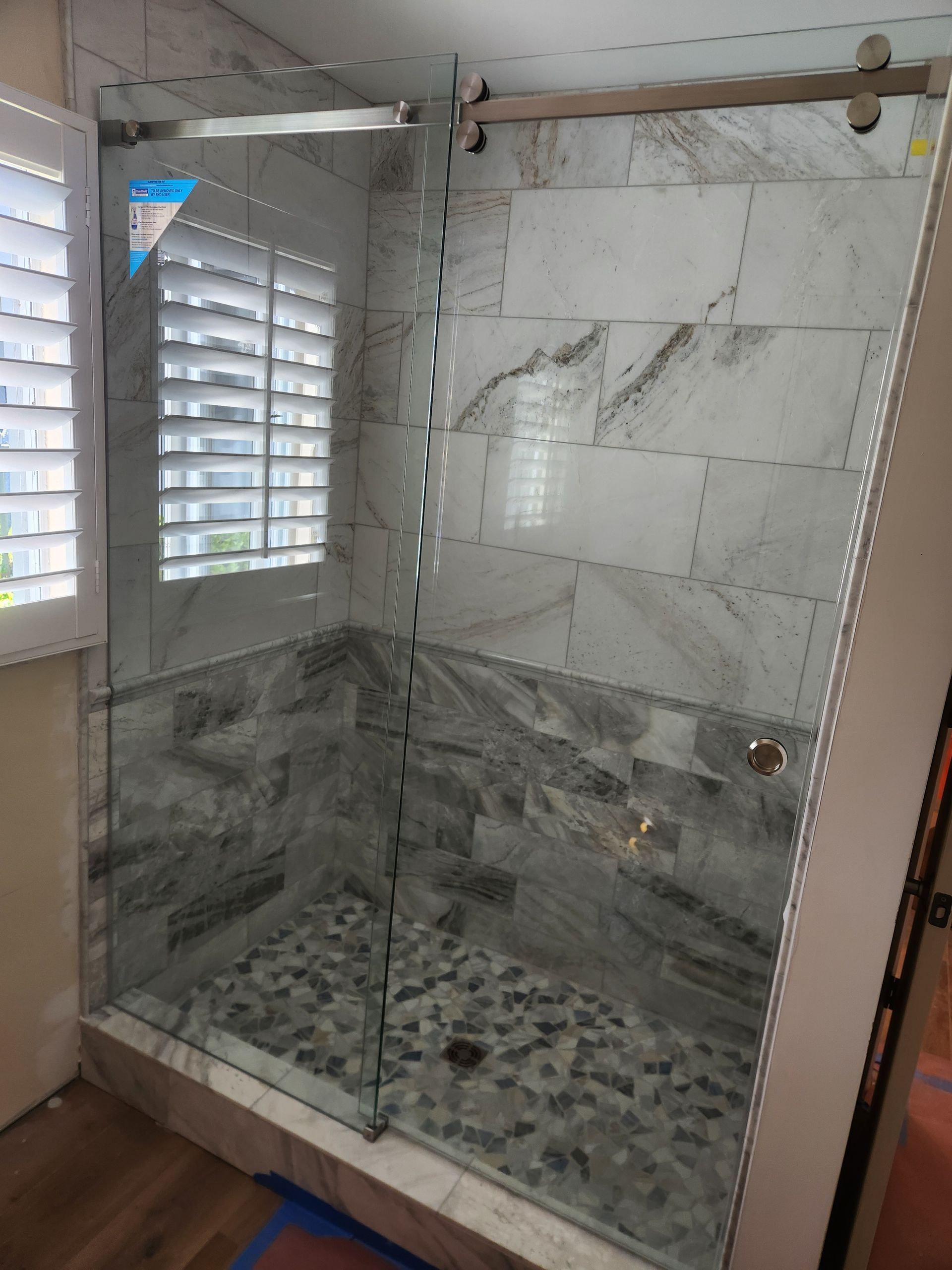 Shower with clear glass CRL Serenity slider brushed nickel