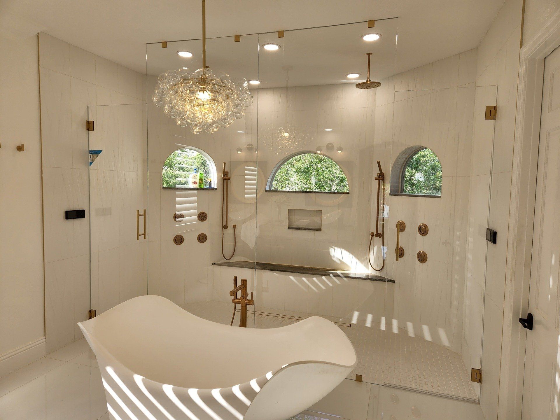 Shower Enclosure with Satin brass clamps