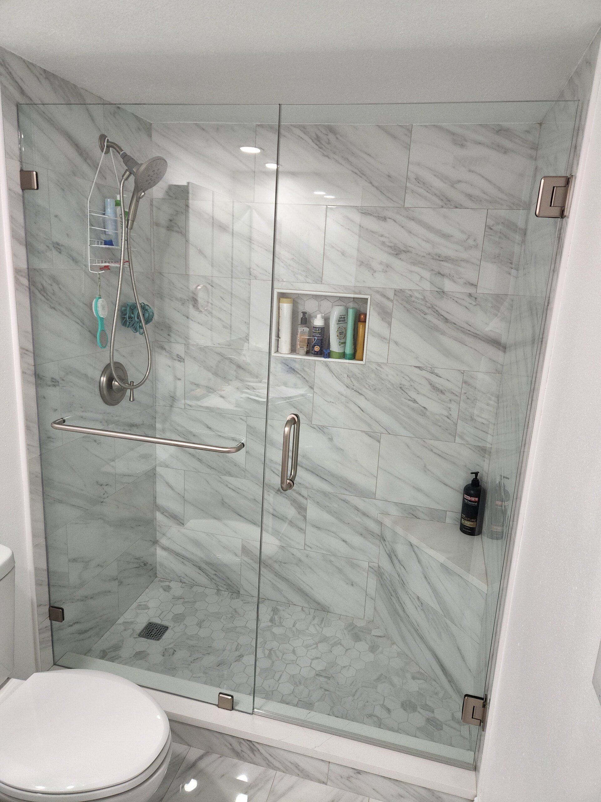 3/8 inline brushed nickel clamps on a tub