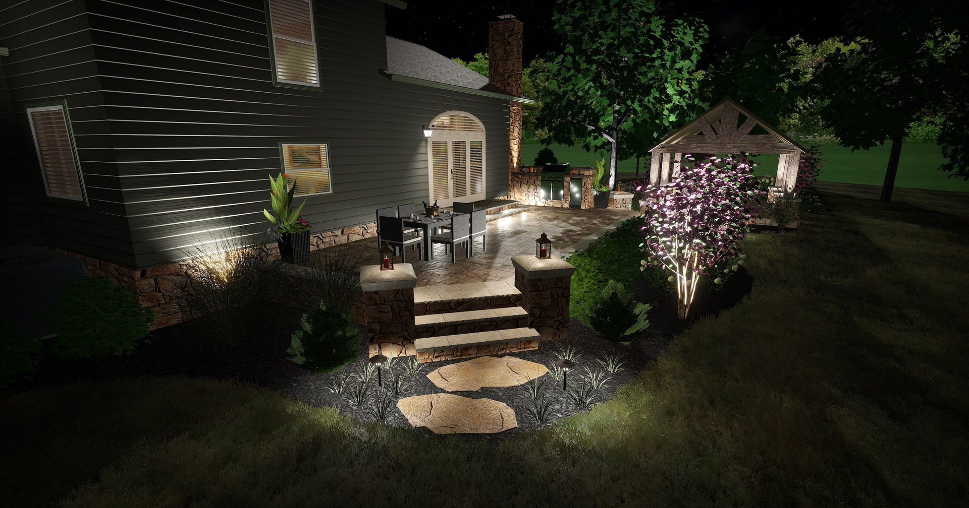 Nighttime garden path lit by warm lights leading to a house patio and small gazebo surrounded by trees.