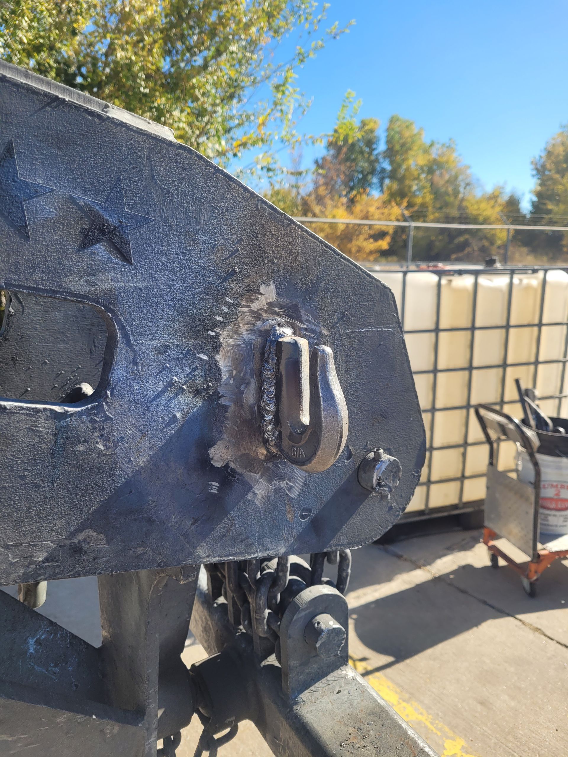 A close up of a piece of metal with a hole in it