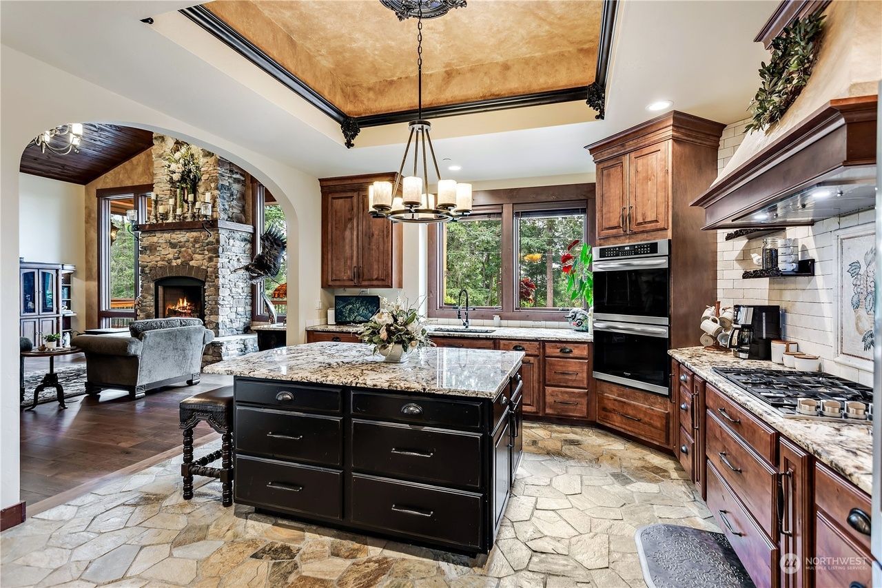 There is a large island in the middle of the kitchen