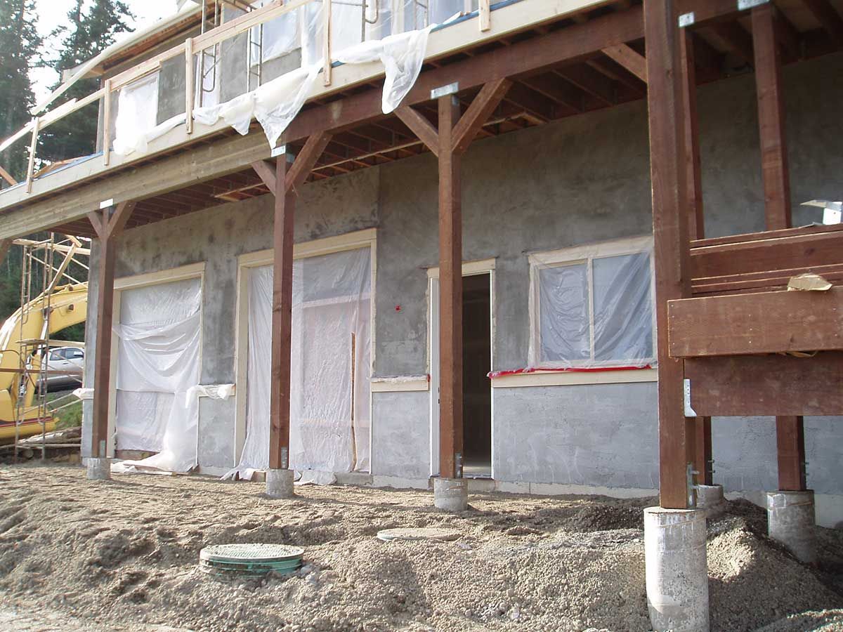 A house that is being built with a large deck