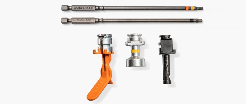 Three hand tools with interchangeable heads, shown with two long bars and three socket attachments on white background
