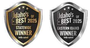 Two shield-shaped emblems for Idaho’s Best 2025; one gold for Statewide Winner, one silver for Eastern Idaho Winner.