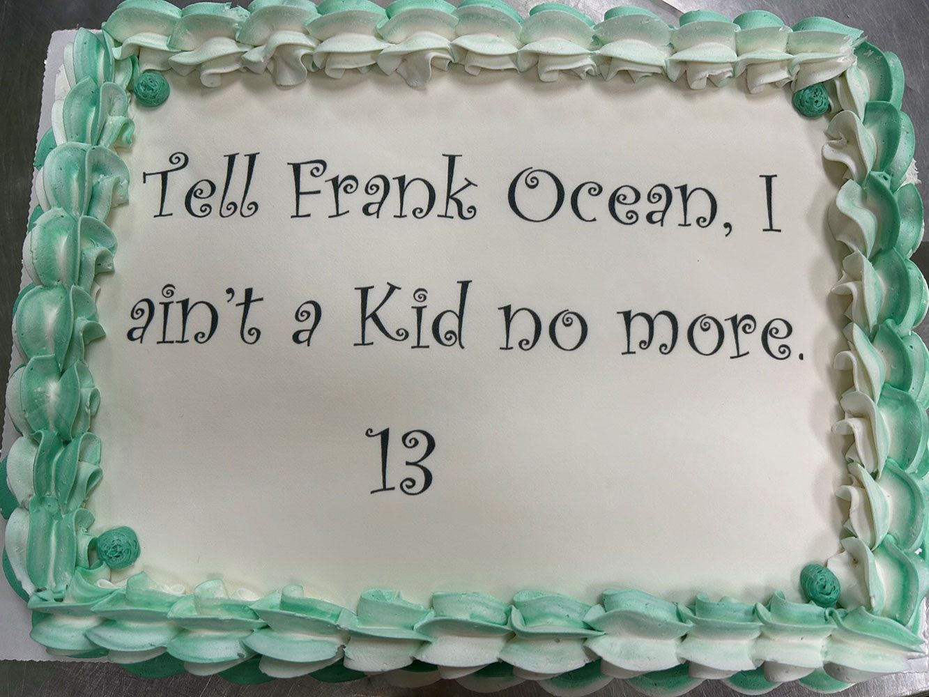 A cake that says tell frank ocean i ain t a kid no more